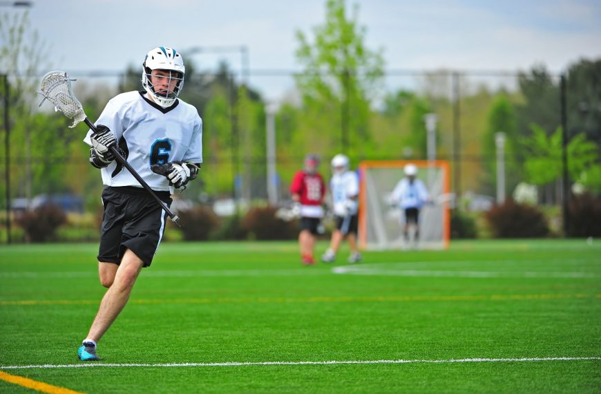 a man playing lacrosse